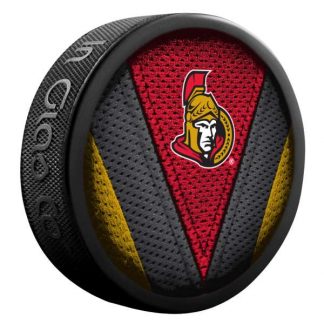 ottawa-senators-stitch-puck